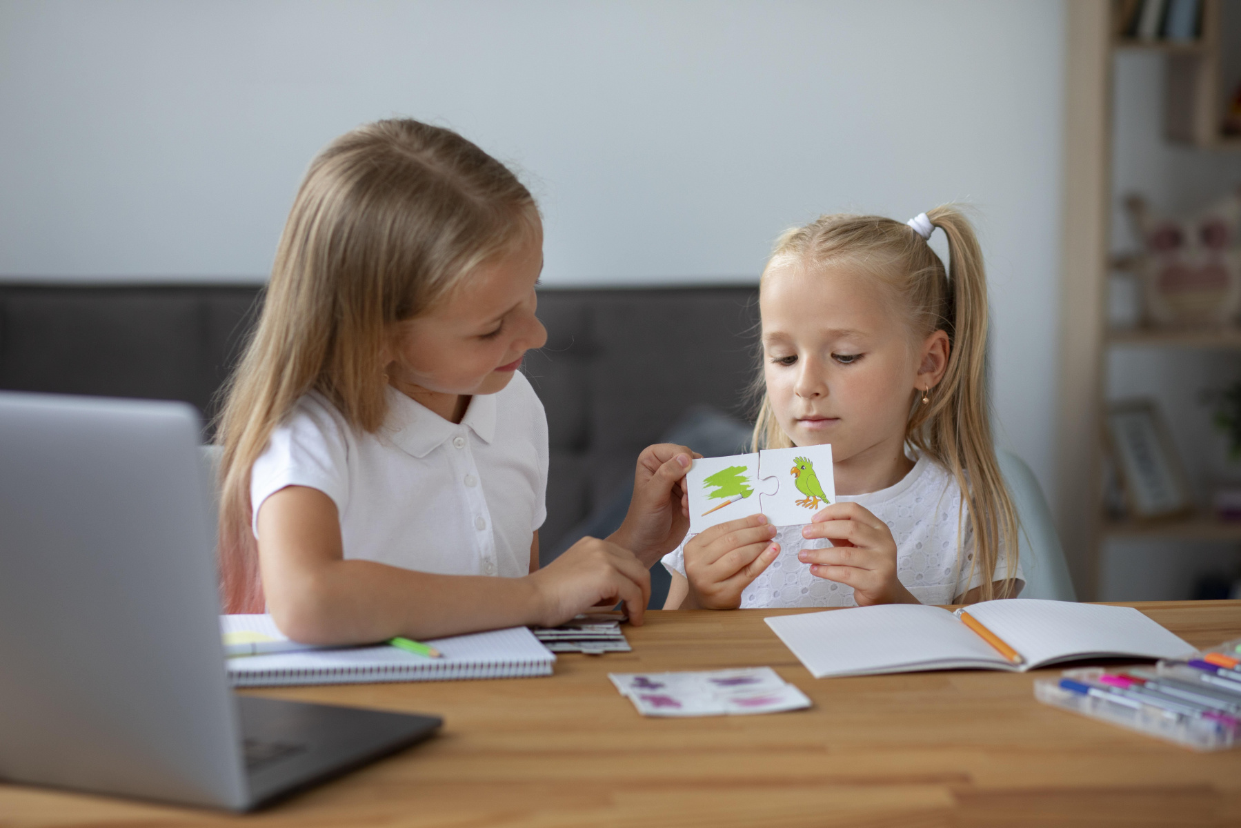little-girls-doing-online-school-together.jpg