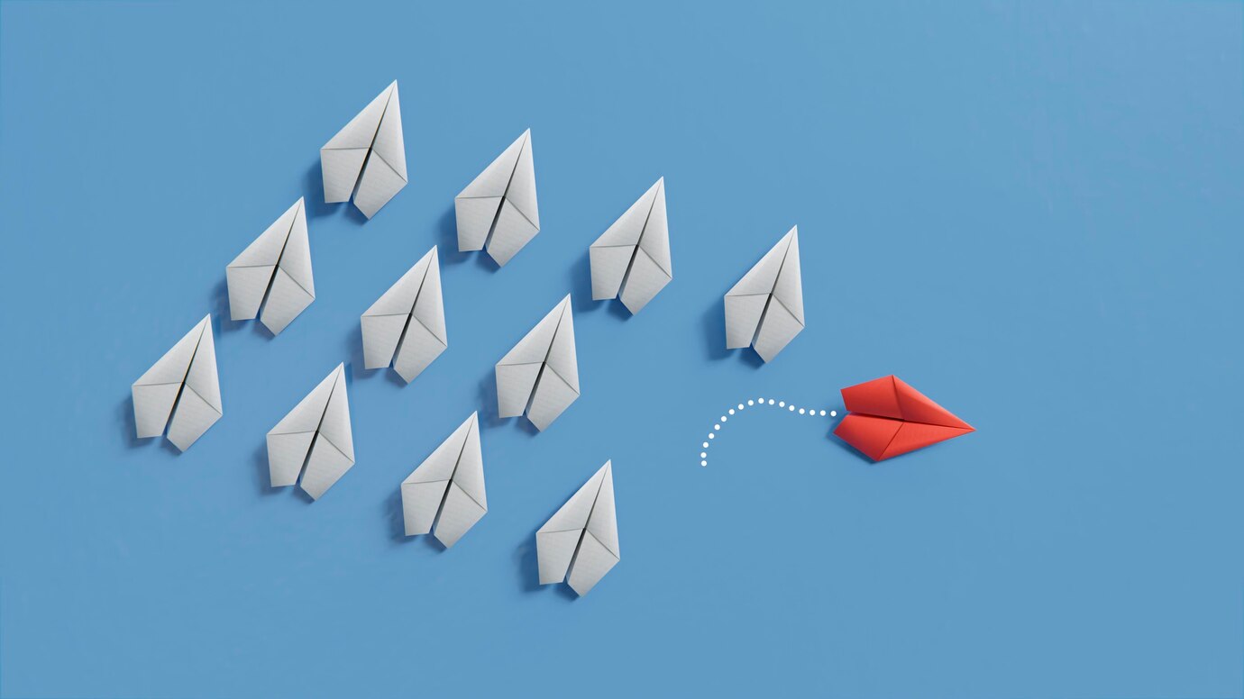 individuality-concept-among-paper-planes_23-2149125653.jpg