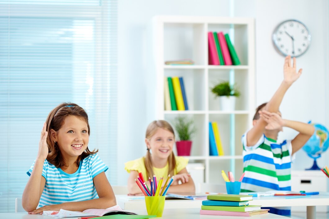students-raising-their-hands-class_1098-1010.jpg