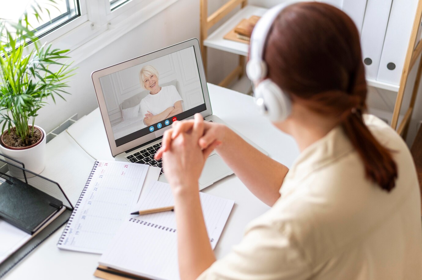 side-view-woman-making-a-video-call_23-2150235666.jpg