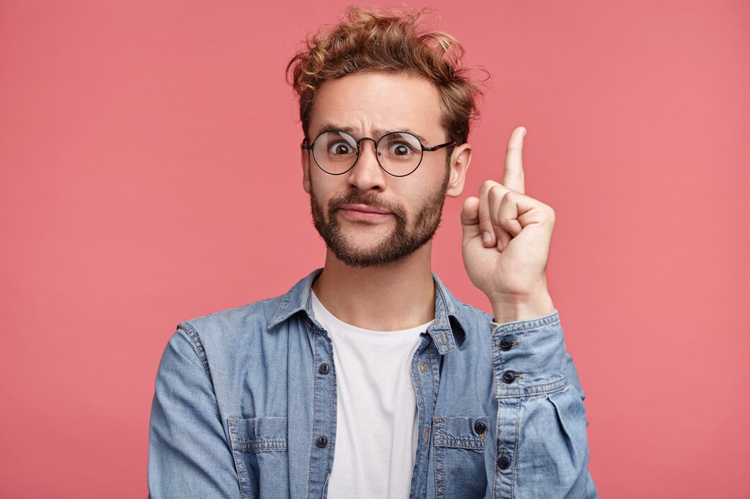 indoor-portrait-of-bearded-young-man-with-trendy-hairstyle_273609-4005.jpg