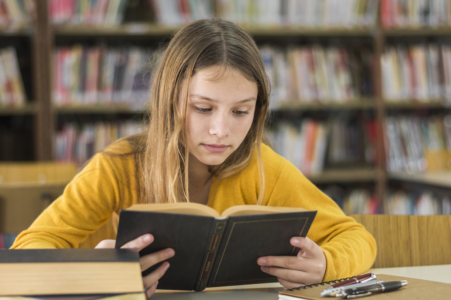 girl-reading-school-library.jpg