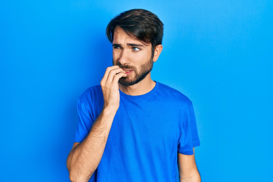 young-hispanic-man-wearing-casual-clothes-looking-stressed-nervous-with-hands-mouth-biting-nails-anxiety-problem_839833-30908.jpg