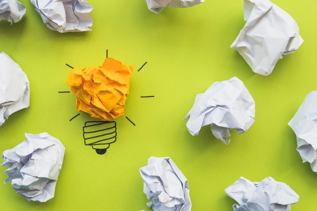 light-bulb-doodle-with-crumpled-paper_23-2147965736.jpg