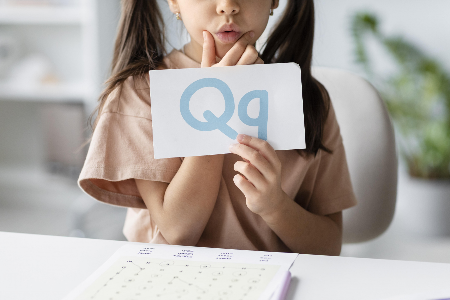 little-girl-holding-paper-with-letter-it-speech-therapy.jpg little-girl-holding-paper-with-letter-it-speech-therapy.jpg