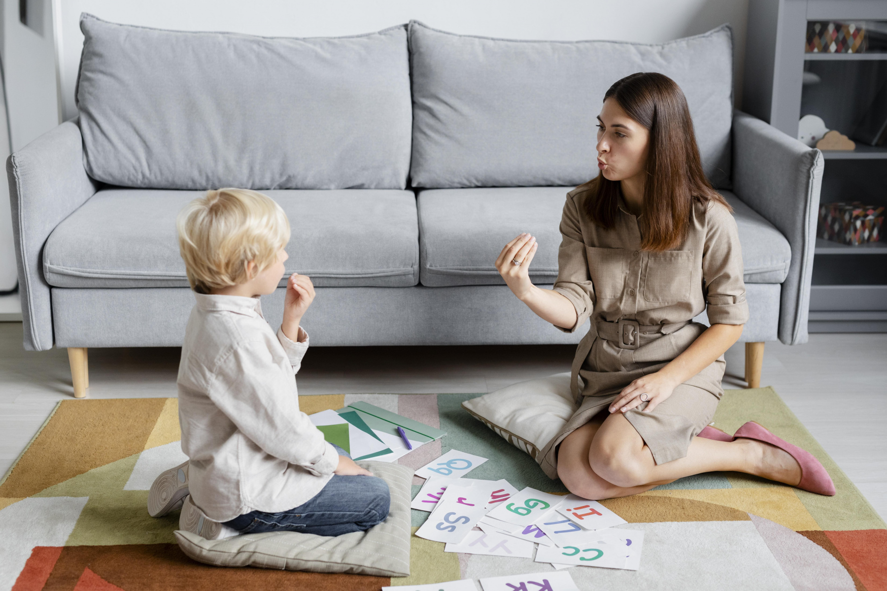 young-woman-doing-speech-therapy-with-little-blonde-boy.jpg young-woman-doing-speech-therapy-with-little-blonde-boy.jpg